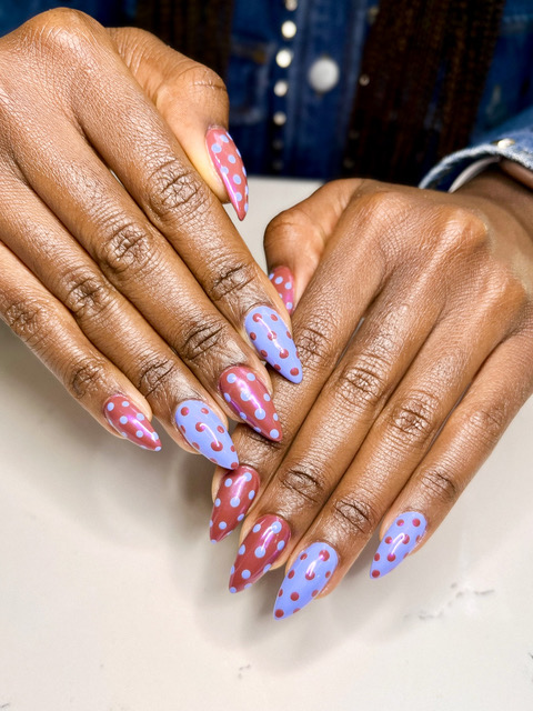 Sculptured polygel nails with blue and pink polka dot nail art