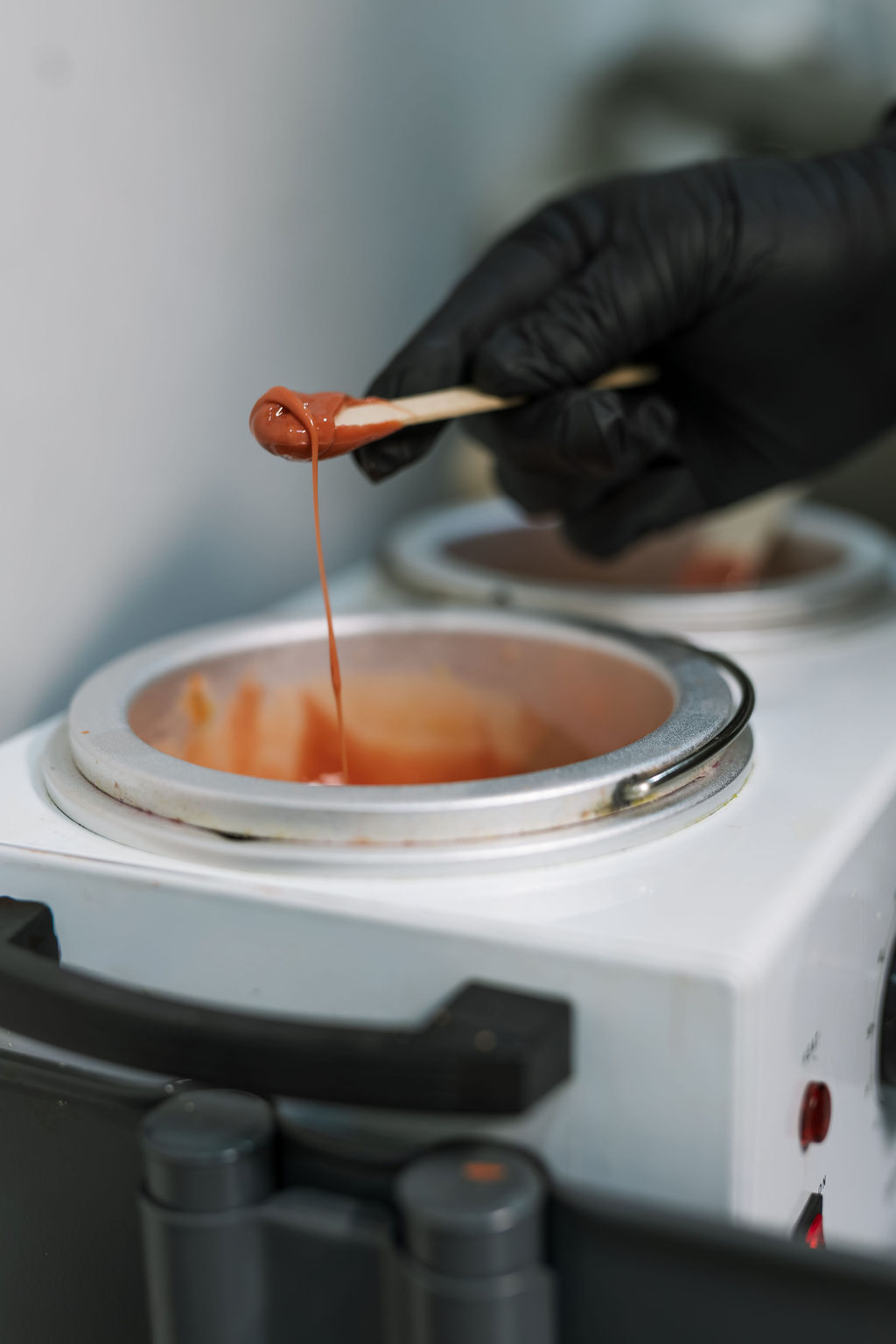 Warm waxing treatment preparation at Lapis Lazuli Beauty Bar